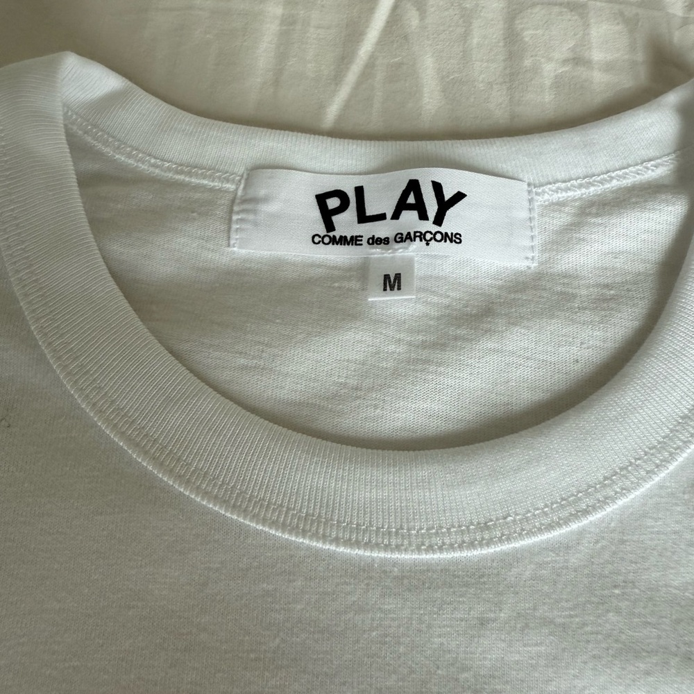 never wore it, the sizes run small in my opinion the size M looks like an S - Picture 3 of 3